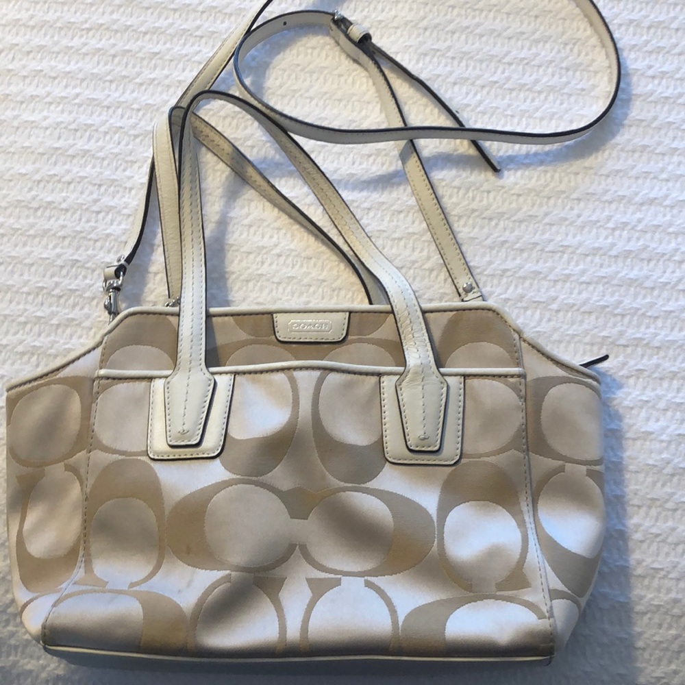 Coach small handbag. Has detachable long strap.